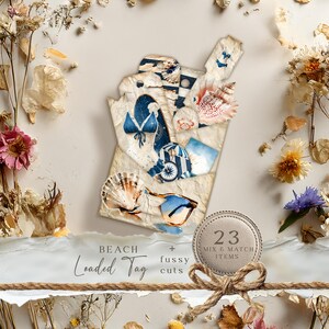May include: A beach-themed loaded tag with fussy cuts, featuring a bikini, seashells, and nautical elements. The tag includes the text "Beach + fussy cuts" and "23 mix & match items". The design incorporates a vintage aesthetic with dried flowers.