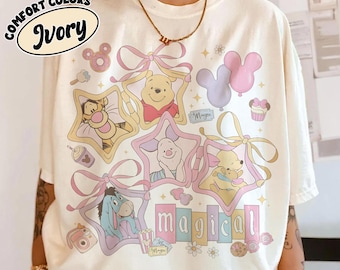 Camiseta retro de Winnie the Pooh con colores mágicos y cómodos, Pooh y compañía en el Reino Mágico, camiseta Disney mágica en tonos pastel, camisetas para viajes familiares a Disney.