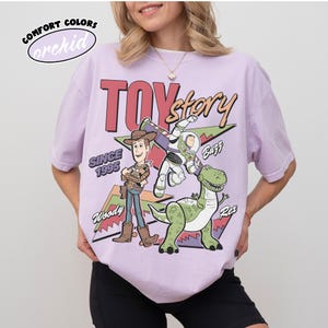 May include: A set of three ceramic mugs with a speckled, matte finish. The mugs are in shades of cream, light grey, and dark grey. Each mug has a simple, minimalist design, ideal for coffee or tea.