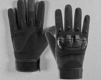 May include: A pair of black tactical gloves. The gloves feature reinforced knuckles and a textured palm for enhanced grip. The wrist area has an adjustable strap with a hook and loop closure. The gloves are designed for protection and durability.