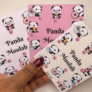 May include: Three square stickers featuring panda bear designs. The stickers have a white, pink, and cream background. Each panda is shown with food items such as ice cream, donuts, and noodles. The text "Panda Moolah" is printed on the stickers.