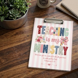 May include: A clipboard with the text "TEACHING is my MINISTRY" in colorful, patterned letters. The clipboard has a pink and white striped background and a metal clip at the top. A pencil with a pink bow is also featured.