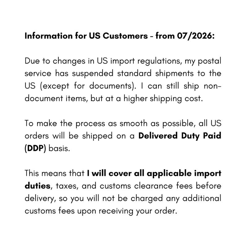 May include: A white informational notice with black text titled Information for US Customers - from 07/2026. The text explains changes in US import regulations, the suspension of standard shipments, and the use of Delivered Duty Paid shipping.
