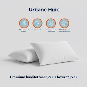 May include: Two white square pillows are displayed on a light gray background. The pillows are made of a soft, smooth fabric. The text "Urbane Hide" is at the top, with icons and text below indicating features like machine washability and hypoallergenic properties.