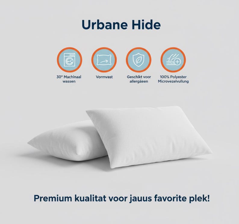 May include: Two white square pillows are displayed on a light gray background. The pillows are made of a soft, smooth fabric. The text "Urbane Hide" is at the top, with icons and text below indicating features like machine washability and hypoallergenic properties.
