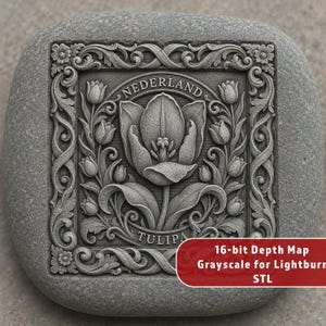 May include: A gray stone with a carved floral design featuring a tulip and the words "Nederland" and "Tulipa". The design is framed by ornate scrollwork and floral elements. The text "16-bit Depth Map Grayscale for Lightburn STL" is in a red rectangle.