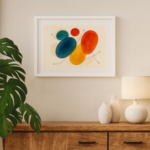 Framed abstract wall art in blue and orange – Solar Harmony