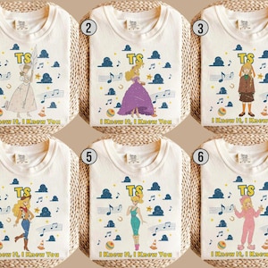 May include: Six off-white t-shirts featuring various cartoon characters, the yellow text TS, musical notes, blue clouds, stars, and the text I Knew It, I Knew You. Each shirt displays a different character including a shepherdess, princess, and cowgirl.