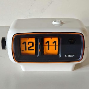 Rare 1970s Citizen Flip Clock – Restored Snow White & Orange