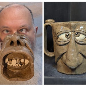 May include: A unique, handmade ceramic mug with a sculpted face design. The mug is tan with a detailed face, including eyes, a nose, and an open mouth with visible teeth. The mug has a handle and measures approximately 5 inches in height.