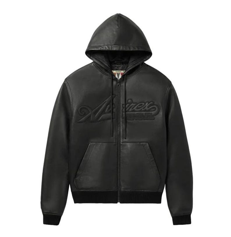 May include: Black leather zip-up hoodie with a hood and front pockets. The jacket features the embossed word "A/rex" across the chest. The cuffs and bottom hem are ribbed.