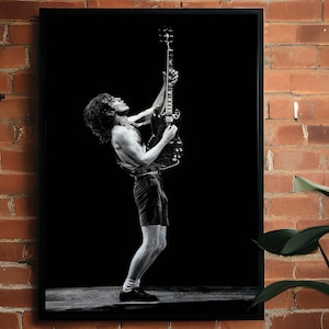 Angus Young ACDC Poster – Rock and Roll Wall Art – Guitarist Canvas Print – Classic Rock Legend Decor – Music Tribute Wall Art