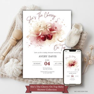 May include: A baby shower invitation with the text "She's The Cherry On Top" featuring watercolor cherries and ribbon. A smartphone displays the same design. The invitation includes the date, time, and honoree's name.