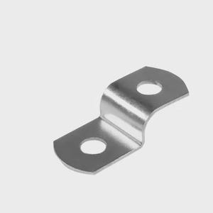 May include: A silver metal bracket with two circular holes and a curved section. The bracket is bent at a 90-degree angle, and is likely used for structural support or mounting.
