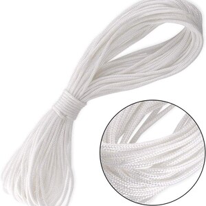May include: A bundle of white nylon cord, tightly wound and secured. A close-up inset shows the detailed texture of the individual strands. This versatile cord is suitable for various crafting and DIY projects.