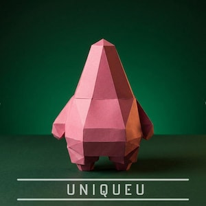 May include: A pink, geometric paper sculpture of a figure with a triangular head, small arms, and feet. The figure is set against a dark green background. The word "UNIQUEU" is written in white at the bottom.