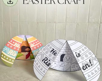 Peut inclure: Deux découpes de papier en forme d'œuf de Pâques. L'une est colorée avec des rayures pastel et une illustration de Jésus. L'autre est un dessin au trait en noir et blanc avec le texte "Il est ressuscité !" et une illustration de Jésus. Le texte "Easter Craft" est en haut.