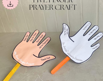 May include: Two paper hand cutouts on popsicle sticks for a five-finger prayer craft. One hand is peach-colored with prayer prompts. The other is white with prayer prompts and the phrase "In Jesus' name, Amen."