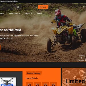 May include: Website banner featuring an ATV rider on a yellow and black quad bike kicking up dirt. The text "The Beast on the Mud" and "Shop Now" are visible. The website's name is "Mystic".