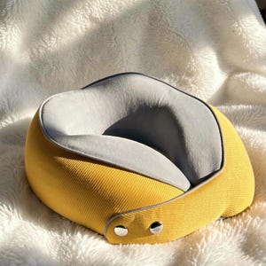 Almohada cervical de viaje de espuma viscoelástica: Soporte cervical ergonómico plegable