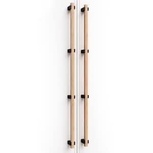 May include: Two long, vertical door handles featuring a light-toned natural wood bar accented with four matte black square mounting brackets each. The handles are mounted side-by-side on a plain white surface, creating a clean, linear aesthetic.