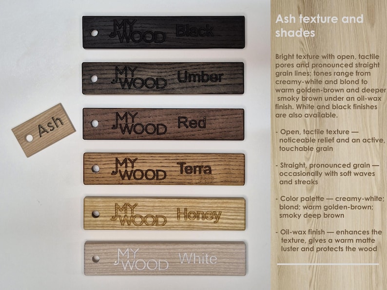 May include: Wooden samples in various shades, including black, umber, red, terra, honey, and white. Each sample is rectangular with a hole and the text "MY WOOD". The image also includes a small "Ash" sample.