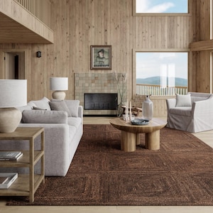 May include: A living room with light-coloured furniture, a brown rug, and a wooden coffee table. The room features a fireplace, large windows, and a view of the outdoors. The walls are panelled with light-coloured wood.