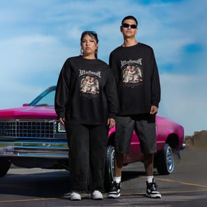 Affectionate Black Sweatshirt Featuring Two Hugging Baby Angels  Cute, Heartwarming Design Perfect for Unisex Everyday Wear