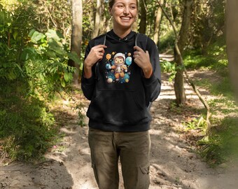 Child with Balloons Graphic Black Hoodie – Cute Kids Illustration, Fun Playful Design, Cozy Pullover for Casual Wear