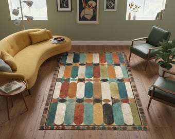 May include: A rectangular area rug featuring a repeating pattern of vertical pill-shaped blocks in shades of teal, burnt orange, mustard yellow, and cream. The rug has a dark border with a repeating circular motif and a distressed, textured finish.