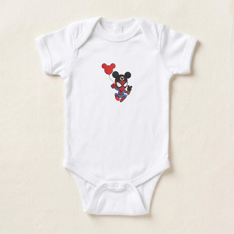 May include: White baby bodysuit featuring a cartoon character mashup of Spider-Man and Mickey Mouse. The character is holding two red balloons. The bodysuit has a snap closure at the bottom and short sleeves.