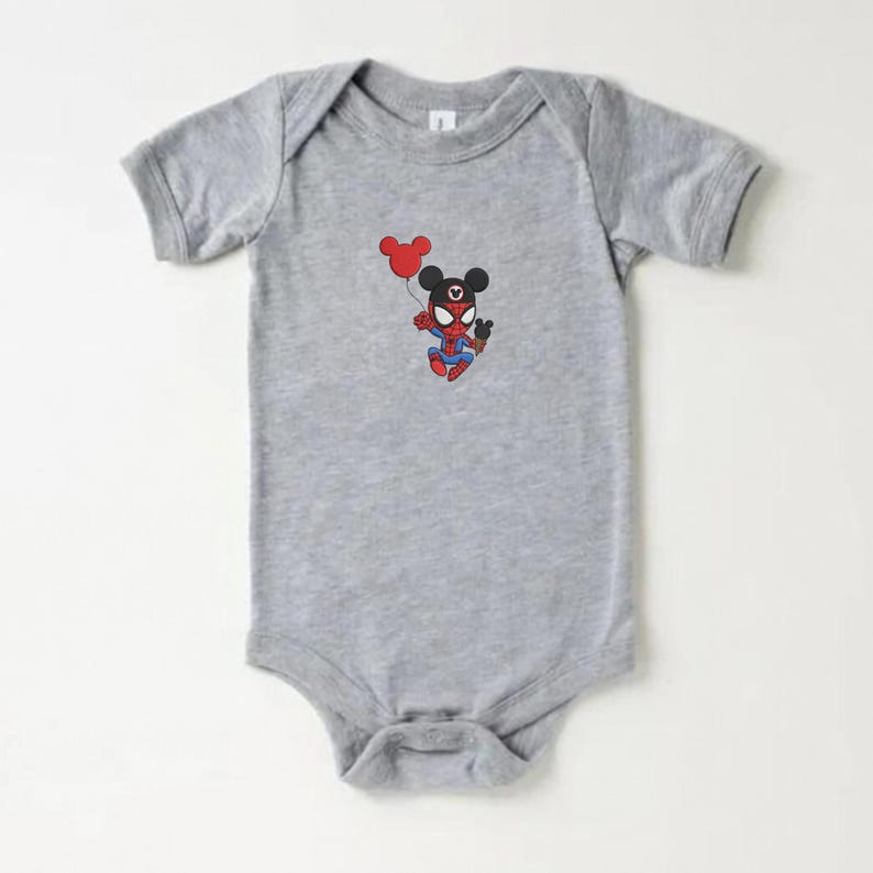 May include: A gray baby onesie featuring a cartoon character that is a hybrid of Spider-Man and Mickey Mouse. The character is holding a red balloon. The onesie has short sleeves and a snap closure.