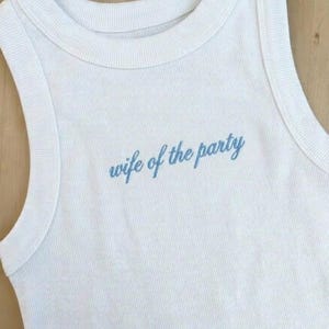 May include: A set of three ceramic mugs with a speckled, matte finish. Each mug features a different color: light blue, cream, and gray. The mugs have a simple, modern design and a comfortable handle.