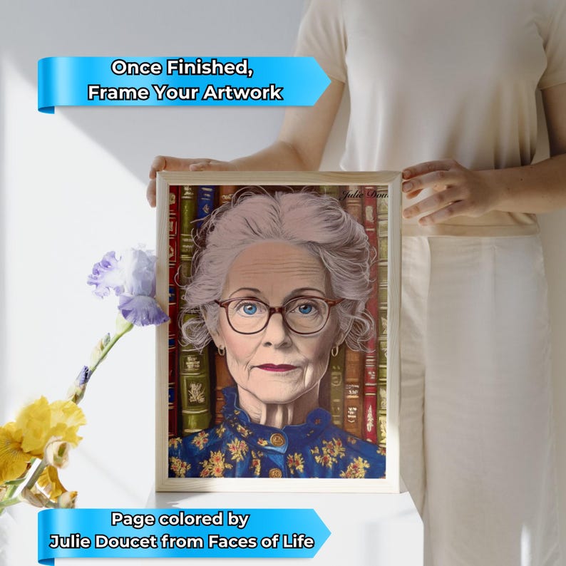 May include: A framed portrait of an elderly woman with glasses, set against a backdrop of books. The artwork is a colored page from "Faces of Life" by Julie Doucet. The frame is light-colored wood. Text on the image reads "Once Finished, Frame Your Artwork."