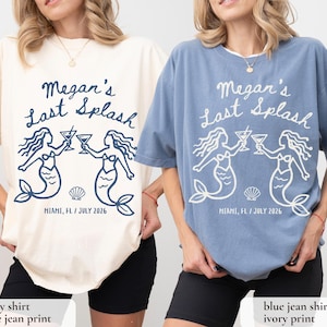May include: Ivory and blue jean t-shirts with the text "Megan's Last Splash" and mermaid graphics. The shirts also include the text "Miami, FL / July 2026". The shirts are a relaxed fit.