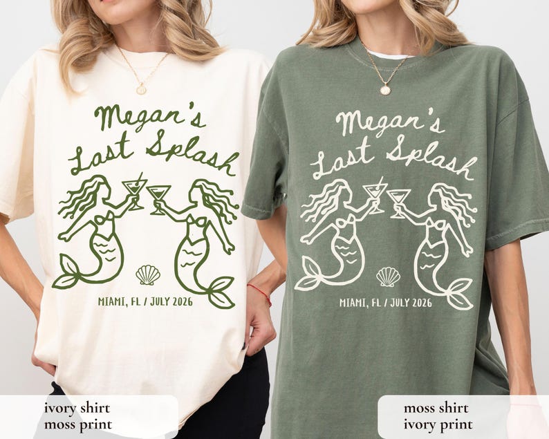 May include: Ivory and moss green t-shirts with a graphic design. The design features the text "Megan's Last Splash" above two mermaid illustrations holding cocktails. Below the mermaids is the text "MIAMI, FL / JULY 2026".