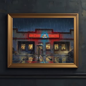 Peut inclure: Œuvre encadrée représentant une scène de nuit pluvieuse dans un restaurant. L'enseigne au néon indique "Los Pollos Hermanos". Une personne avec un parapluie marche sous la pluie. L'œuvre est dans un cadre doré et est accrochée à un mur sombre.