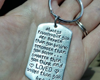 Braver Stronger Smarter Loved Dog Tag Style Keychain.