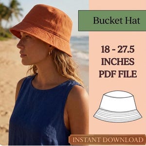 Könnte beinhalten: Ein orangefarbener Fischerhut mit strukturierter Krempe. Der Hut wird von einer Person getragen, die ein blaues ärmelloses Oberteil trägt. Das Bild enthält den Text "Bucket Hat" und "45 - 70 cm PDF FILE".