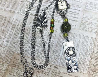 Steampunkketting: vintage uurwerk, zilveren zonnebloemhanger en -blad, cadeaus voor vrouwen