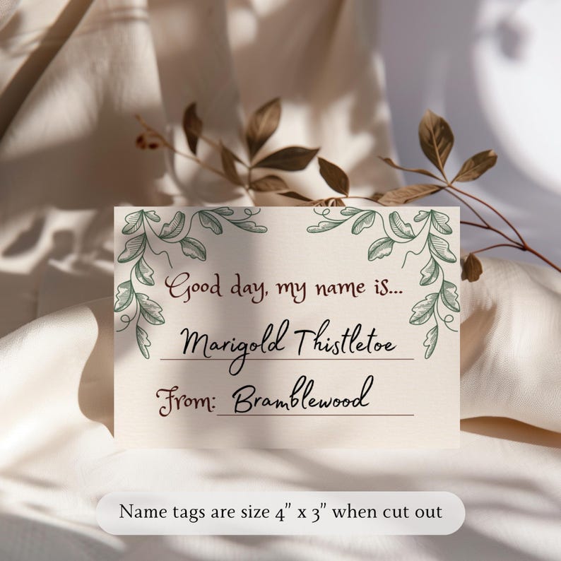 May include: Cream-colored name tag with the text "Good day, my name is... Marigold Thistletoe From: Bramblewood." The tag is decorated with green floral illustrations. The name tags are 4" x 3" when cut out.