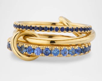 Anillo de eternidad completo con tanzanita y zafiro azul con circonita cúbica y baño de oro de 14 k. Anillo Spinelli Kilcollin. Anillo apilable de dos tonos.