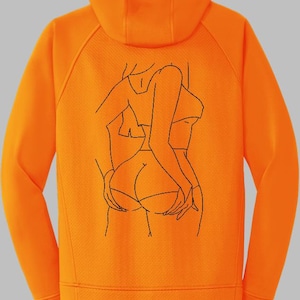 May include: Bright orange hoodie with a black line art illustration on the back. The illustration depicts a stylized figure. The hoodie has a hood and a textured fabric.