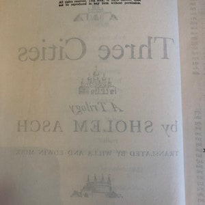 May include: A black and white image of a book cover with the title "Three Cities" and the author's name "By A.J.  HOLMES". The book was published in 1943 by G.P. Putnam's Sons.