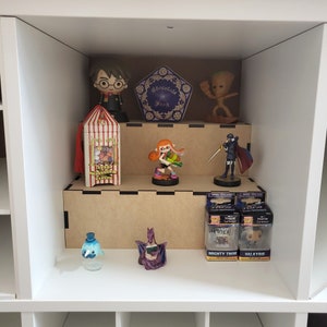 2 tier display unit for ikea kallax with some collectibles.