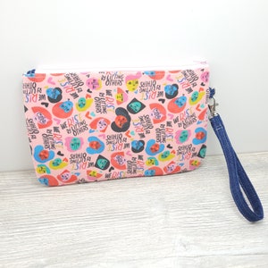 We Rise By Lifting Others Zippy Clutch with detachable Wristlet Strap