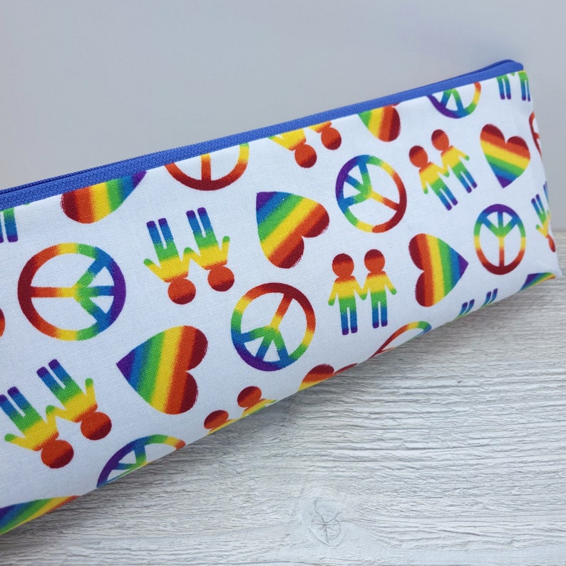 Peace, love and pride pencil pouch.