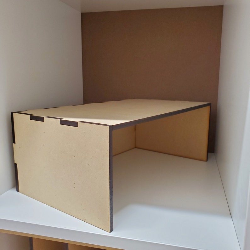 back of unfinished cube shelf riser