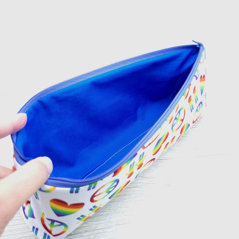 Peace, love and pride pencil pouch.