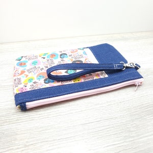 We Rise By Lifting Others Zippy Clutch with detachable Wristlet Strap